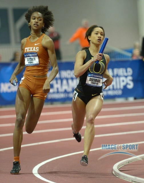 Mar 15, 2014; Albuquerque, NM, USA; Kendall Baisden of Texas (left) and Christian Brennan of Oregon on the third leg of the womens 4 x 400m relay in the 2014 NCAA Indoor Championships at Albuquerque Convention Center. Oregon won in a collegiate record 3:27.40.