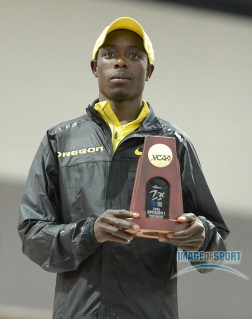 Mar 15, 2014; Albuquerque, NM, USA; Edward Cheserek of Oregon poses on the awards podium after winning the 3,000m in 8:11.59 in the 2014 NCAA Indoor Championships at Albuquerque Convention Center.