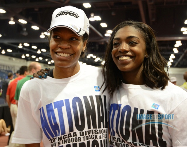 Mar 15, 2014; Albuquerque, NM, USA; Phyllis Francis (left) and Sasha Wallace of Oregon pose after the Ducks won the womens team title in the 2014 NCAA Indoor Championships at Albuquerque Convention Center.