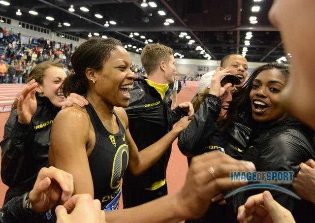 Mar 15, 2014; Albuquerque, NM, USA; Phyllis Francis (left) and Sasha Wallace of Oregon celebrate after the Ducks won the womens team title in the 2014 NCAA Indoor Championships at Albuquerque Convention Center.