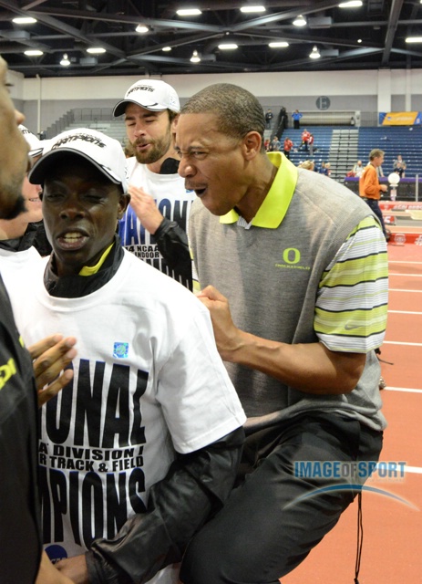 Mar 15, 2014; Albuquerque, NM, USA; Oregon Ducks coach Robert Johnson (right) and Edward Cheserek celebrate after the Ducks won the team title in the 2014 NCAA Indoor Championships at Albuquerque Convention Center.