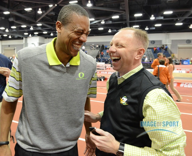 Mar 15, 2014; Albuquerque, NM, USA; Oregon Ducks coach Robert Johnson (left) celebrates with athletics director Rob Mullens after the Ducks won the mens and womens team titles in the 2014 NCAA Indoor Championships at Albuquerque Convention Center.