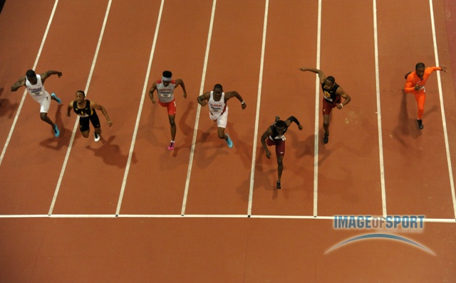Mar 15, 2014; Albuquerque, NM, USA; Dentarius Locke of Florida State (lane 3) wins the 60m in 6.52 in the 2014 NCAA Indoor Championships at Albuquerque Convention Center. From left: Antwan Wright (Florida), Ryan Milus (Arizona State), Cameron Burrell (Houston), Diondre Batson (Alabama), Locke and Aaron Brown (Southern California) and Tevin Hester (Clemson).
