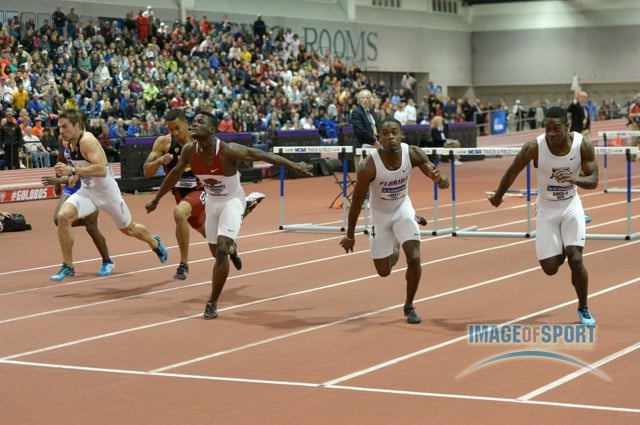 Mar 15, 2014; Albuquerque, NM, USA; Omar McLeod of Arkansas (center) wins the 60m hurdles in 7.58 in the 2014 NCAA Indoor Championships at Albuquerque Convention Center. From left: Greggmar Smith of Indiana State and Milan Ristic of California and Aleec Harris of Souther California and McLeod and Eddie Lovett of Florida and Wayne Davis II of Texas A&M.