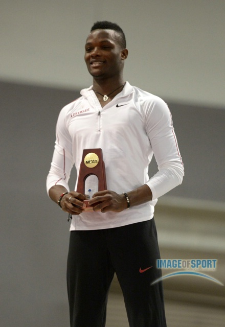 Mar 15, 2014; Albuquerque, NM, USA; Omar McLeod of Arkansas poses on the awards podium after winning the 60m hurdles in 7.58 in the 2014 NCAA Indoor Championships at Albuquerque Convention Center.