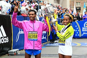 Lelisa Desisa and Caroline Rotich