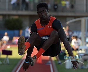 Marquis Dendy of Florida wins the long jump in a wind-aided 27-8