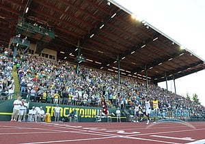 Jun 12, 2015; Eugene, OR, USA; Andre De Grasse of Southern California defeats Dedric Dukes of Florida and Trayvon Bromell of Baylor to win the 200m in a wind-aided 19.58 in the 2015 NCAA Track & Field Championships at Hayward Field.