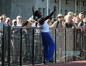 Jun 12, 2015; Eugene, OR, USA; Marquis Dendy of Florida takes a selfie with fans after winning the triple jump in a wind-aided 58-1 1/4 (17.71m) in the 2015 NCAA Track & Field Championships at Hayward Field.