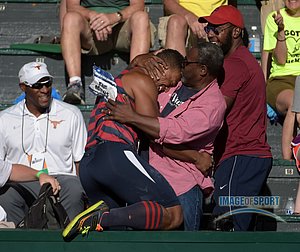 Jun 12, 2015; Eugene, OR, USA; Sam Mattis of Penn State celebrates with father Marlon Mattis after winning the discus with a throw of 205-0 (62.48m) in the 2015 NCAA Track & Field Championships at Hayward Field.