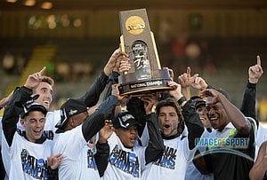 Jun 12, 2015; Eugene, OR, USA; Members of the Oregon Ducks mens team and coach Robert Johnson hoist the championship team trophy at the 2015 NCAA Track & Field Championships at Hayward Field.