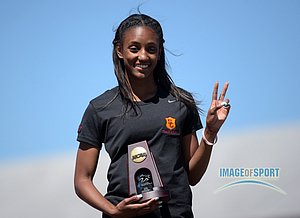 Dior Hall of Southern California poses after finishing third in the womens 100m hurdles