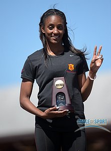 Dior Hall of Southern California poses after finishing third in the womens 100m hurdles