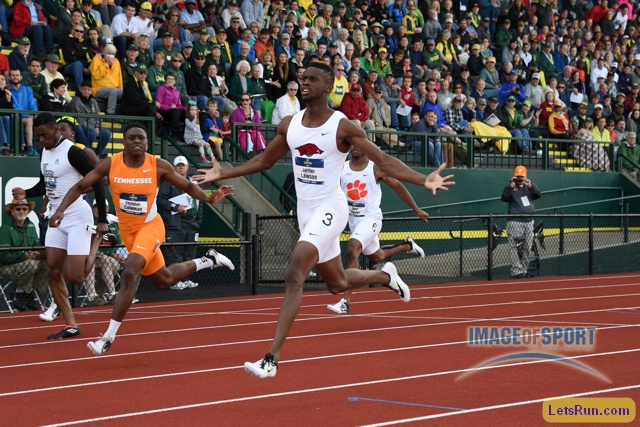 Jarrion Lawson of Arkansas celebrates after defeating Christian Coleman in 200