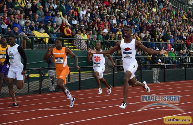 Jarrion Lawson of Arkansas completes the triple ahead of Christian Coleman of Tennessee