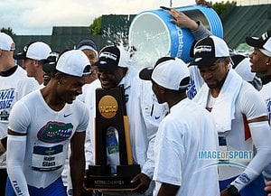 Jun 10, 2016; Eugene, OR, USA; Florida Gators coach Mike Holloway is doused in celebration after the Gators won the men's team title during the 2016 NCAA Track and Field championships at Hayward Field.