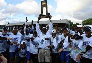 Jun 10, 2016; Eugene, OR, USA; Florida Gators coach Mike Holloway hoists the national champion trophy after the Gators won the men's team title during the 2016 NCAA Track and Field championships at Hayward Field.