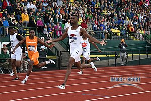 Jarrion Lawson of Arkansas celebrates after defeating Christian Coleman in 200