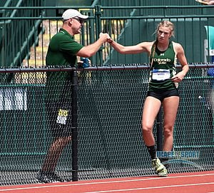 Jun 11, 2016; Eugene, OR, USA; Jessica Green of Colorado State (right) talks with multievents coach Ryan Baily during the heptathlon long jump at the 2016 NCAA Track and Field championships at Hayward Field.