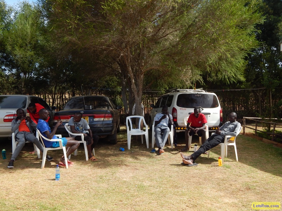 Runners Sitting outside in Shade waiting for run #2 of day