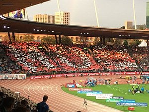 Fans in Packed  Letzigrund Stadium with Signs Saying "Mo"