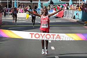 Rose Chelimo Wins