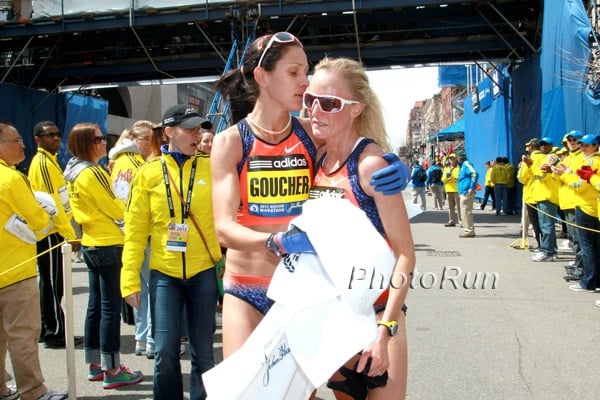 Kara Goucher and Shalane Flanagan console eachother after the 2013 Boston Marathon