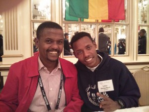 Lelisa Desisa (r.), with translator Gemedu Dedefo, was full of smiles and confidence.jpg