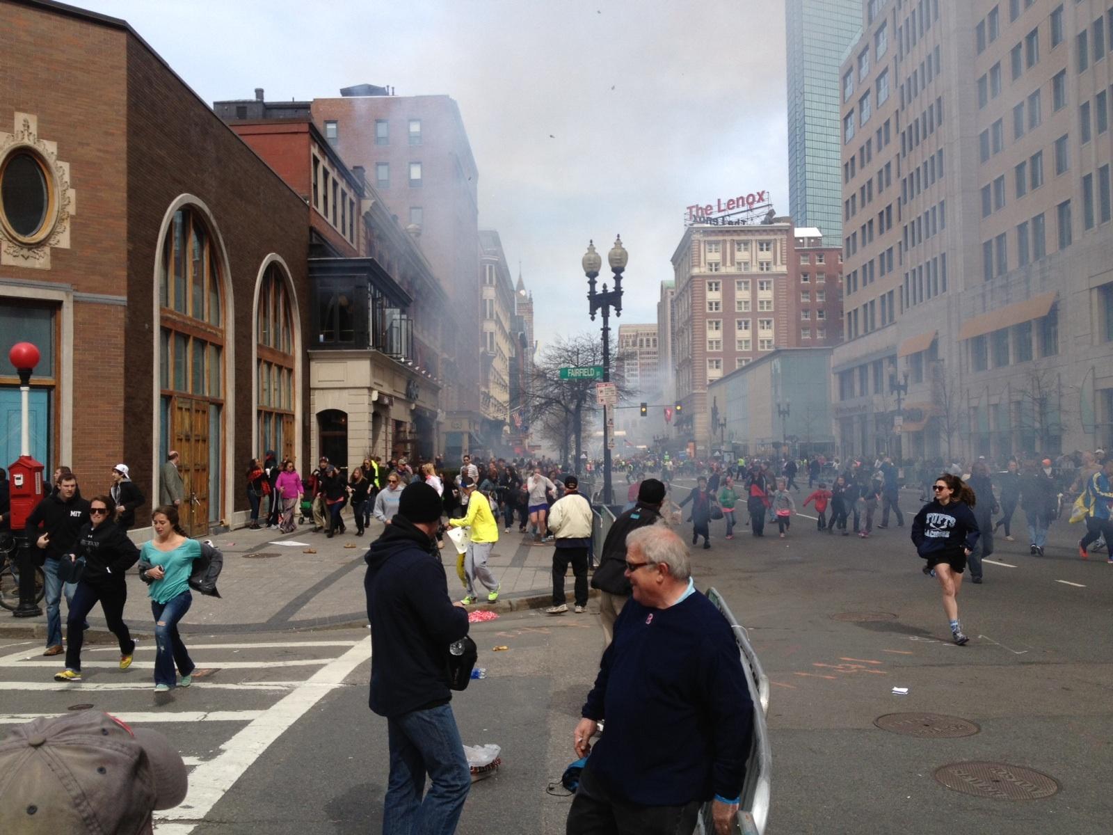 Update #2: The NY Times has a story here on this photo  and the man who took it (David Green). Picture of suspected 2012 Boston Marathon terrorist after blast without backpack. For more on this photo, please see here: http://www.letsrun.com/forum/flat_read.php?thread=5140936 This photo was NOT taken by LetsRun.com.  The original link posted by a regular LetsRun.com visitor can be found here (NSFW) on  a site with pornographic ads. People complained about the porn ads so we have uploaded the photo here.The LetsRun.com audience is discussing this photo here