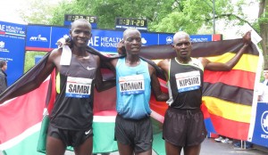 (l. to r.) Stephen Sambu of Kenya (3rd place), Leonard Patrick Komon (1st) and Moses Kipsiro (2nd) after finishing the 2013 Healthy Kidney 10-K (photo by Jane Monti for Race Results Weekly)