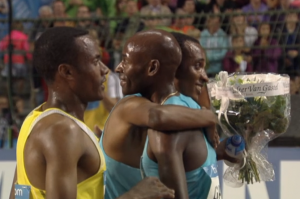Lagat gets a well-deserved hug