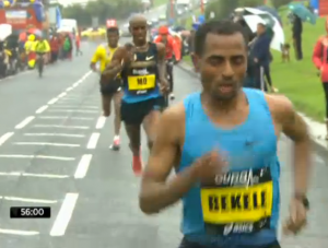 Bekele pulling away from Farah in the half