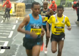 Bekele makes his move on downhill and then uphill leading to 12th mile mark