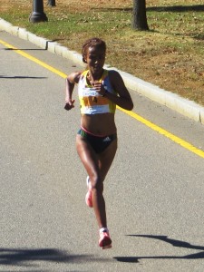 Sentayehu Ejigu on her way to winning the 2013 Tufts Health Plan 10-K for Women in Boston in a course record 31:32.9 (photo by Chris Lotsbom for Race Results Weekly)