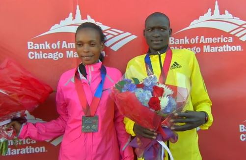 Jeptoo with men's winner Dennis Kimetto