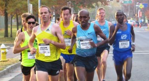 Aaron Braun (front row, bright yellow kit) leads Matt Llano (far left with sunglasses), Tim Ritchie (second row, yellow/blue kit), Abdi Abdirahman, Matt Tegenkamp and Shadrack Biwott at the inaugural .US National Road Running Championships (photo by Chris Lotsbom for Race Results Weekly)