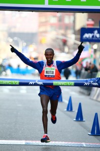 Geoffrey Mutai of Kenya wins the 2014 NYC Half in 1:00:50 on March 16. (PhotoRun/NYRR)