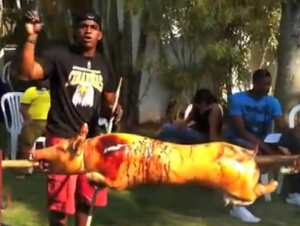 Yoenis Céspedes roasts a pig