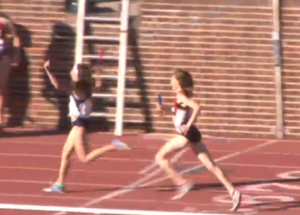 Emily Lipari celebrates 2014 Penn Relays win