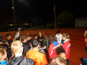 Mo Farah swarmed for autographs after the meet