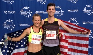 Amy Hastings with Christo Landry after they won July's Peachtree Road Race