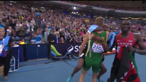 Amos rejoiced with South Africa's Andre Olivier after the race