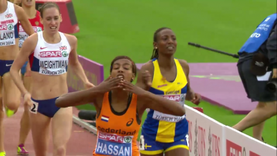 Hassan blew kisses to the crowd upon crossing the finish line