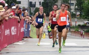 Diego Estrada (53) sprints to victory over Maverick Darling (98), German Fernandez (54) and Brian Shrader (partially obscured).  Photo by Chris Lotsbom for Race Results Weekly