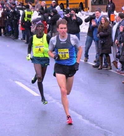 Sam Chelanga (l) and Ben True battle in the final sprint at the 2014 Manchester Road Race (photo by Jane Monti for Race Results Weekly)