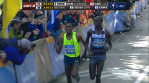 Kipsang Looks at Lilesa After Lilesa Made Contact and Retook the Lead