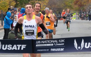 Brian Shrader winning his first USA road running title at the 2014 .US 12-K Championships in an American record 34:11 (photo by Jane Monti for Race Results Weekly)