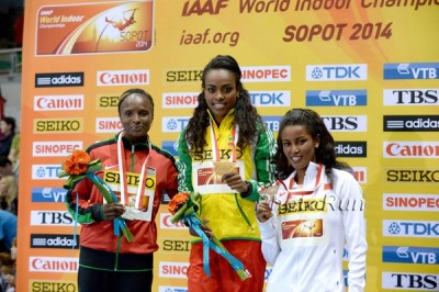 Obiri (left) on the podium after her silver at World Indoors with fellow medallists Genzebe Dibaba and Maryam Yusuf Jamal.