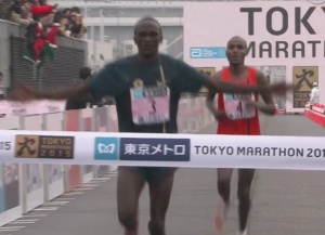 Stephen Kiprotich did not win but he still got to break the tape in 2nd and celebrate (we're not sure why)