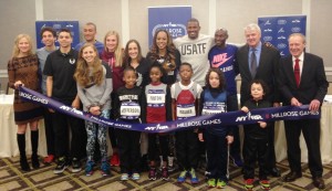 Athletes and officials gathered with school children at a press conference in advance of the 2015 NYRR Millrose Games. Adults (from left to right): Mary Wittenberg, President & CEO of New York Road Runners; Cam Levins, Canadian Olympian; Matthew Centrowitz, two-time 1500m medalist at IAAF World Championships; Ashton Eaton, 2012 Olympic decathlon gold medalist; Mary Cain, 2014 IAAF World Junior 3000m champion; Brianne Theisen-Eaton, 2013 IAAF World Championships heptathlon silver medalist; Shannon Rowbury, 2009 IAAF World Championships 1500m bronze medalist; Sanya Richards-Ross, 4-time Olympic gold medalist; David Oliver, 2013 IAAF World Championships 110m hurdles gold medalist; Bernard Lagat, 8-time Wanamaker Mile champion; Ray Flynn, NYRR Millrose Games Meet Director; Dr. Norbert Sander, President of Armory Foundation (photo by Chris Lotsbom for Race Results Weekly)
